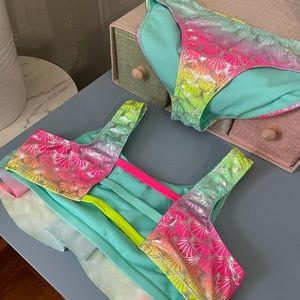 Bundle of two sets of swimwear. Size XXL (18) big girls. Never been used